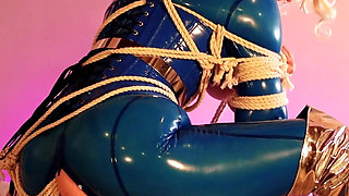 Latex bondage escape, sexy MILF submissive in rubber with gag