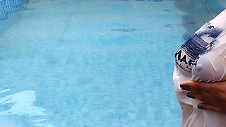A Hot Couple's Risky Fun in the Swimming Pool.