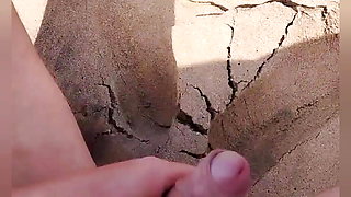 masturbation handjob on the beach looking at a naked woman