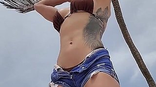 Giant Muscular Goddess on the Beach