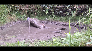 In the mud on the outskirts of the city