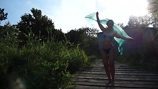 Semi-nude dance on planket