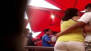 Huge fanny MILF followed in street candid voyeur video