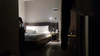 Cute amateur asian web cam girl playing with her toy