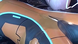 Latex Danielle is attached to the bed and masturbated with the massage vibrator