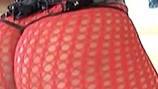 Blacl and Busty Slut with Colored Hair and Fishnet Stockings Gets Fucked by a Big Black Cock