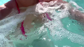 Artemisia Love Sexy and Horny Underwater Showing Her Big Tits in a Super Micro Bikini and You Can See Her Aureolas…