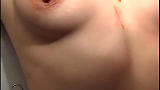 Bondage blonde gets pussy and nipples tormented during wax play