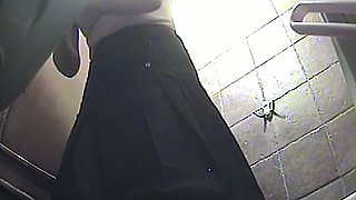 Delicious booty of a white girl in black stockings recorded in the toilet