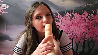 Japanese Girl Getting Fucked by a Torso with Silicone Cock
