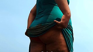 Outdoor solo scene with Ivana masturbating pussy