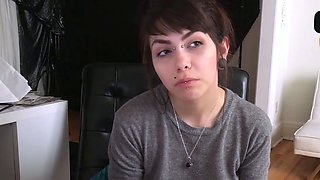 Brunette wanks with a large fake penis solo