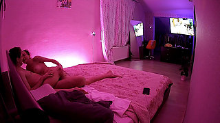 Kamila and Danildo cuddling in bed