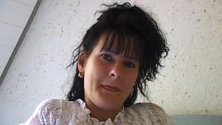 Horny girl lays in bed finger fucking herself and stroking clit