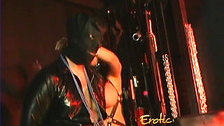 Busty mistress and her slave in leather