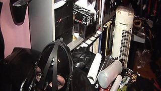 Dominatrix Trains Hooded Slave with Huge Dildo