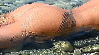 My Sexy Beauty Is Sunbathing on a Nudist Beach