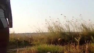 African amatuer spraying milk outdoors