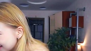 Blonde mature with big boobs masturbates in bed