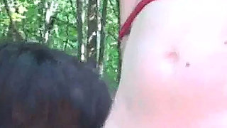 Cock to blow, tied to the tree