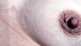 My pointing in the hot tub with the waterfall