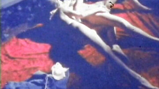 Blue-tinted Vintage Loop Shows Retro Couple in Raw 70s Action