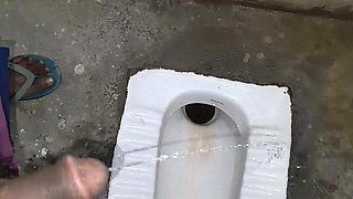 Desi Bhabhi Holding Stepbrother-in-law's Penis and Making Him Pee and Peeing Herself