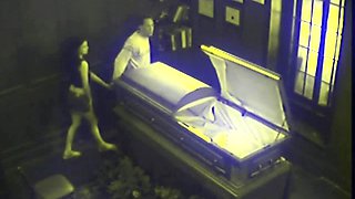 Couple Fucking in Coffin