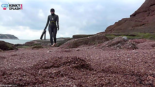 Wetsuit Giantess Finds a Tiny Toy to Tease