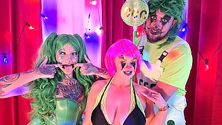 Bonnie Rose in an LED tutu takes doggy with a green-shirt grip