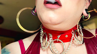 Leather Clad Tina Snua Smoking A Cigarette With Lots Of Dangles