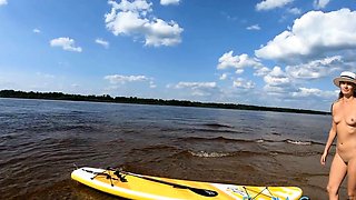 Big-Ass Blonde's Naked Walk on a Paddleboard