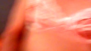 Lars Damberger masturbating in coral satin underwear