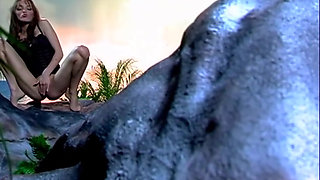 Lesbian Babes Fingering and Licking on Beach Rocks at Sunset