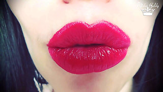 Luscious red lips tease