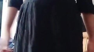 Indian Homo Crossdresser Gaurisissy demonstrating and pressing her large bra-stuffers in black sundress