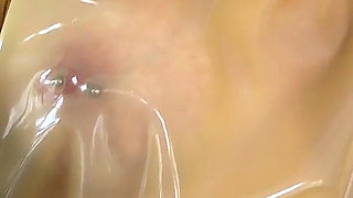 Latex Maid Masturbating at Work