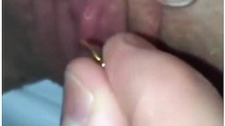 Close Up View Of Her Clit Piercing Jewelry Insertion