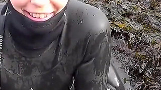 Rubbery Beach Encounter: Lucy's Neoprene Pussy Play with Stranger