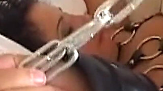 Mature Brunette MILF in Chains Deepthroats and Rides Hard