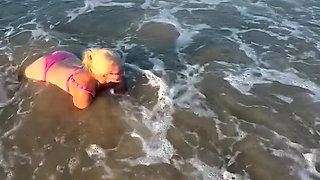 Try Not to Wet My Hair While Play with the Waves