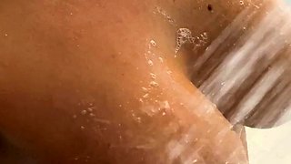 Busty curly brunette with big boobs fucks on couch
