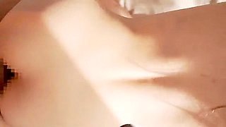 He thrusts into her from behind, slapping her ass, and then fucks her in the cowgirl position, making her squirt.