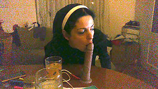 Mature slut  sucking big dildo