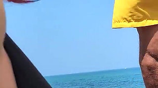 Stranger on the Beach Picks up Lifeguard