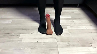 Sexy Dominatrix in Nylon Pantyhose Is Trampling Your Cock