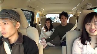 Naughty Japanese babe spreads her legs to get pussy fingered in a car