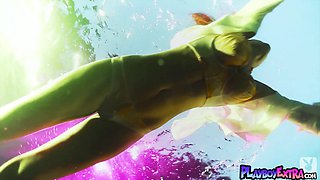 Young girl reveals her slit under the water