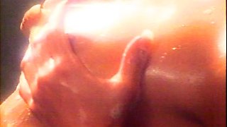 Busty babe in red high heels masturbates solo