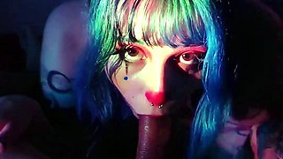 cute clown girl teasing your dick with her mouth